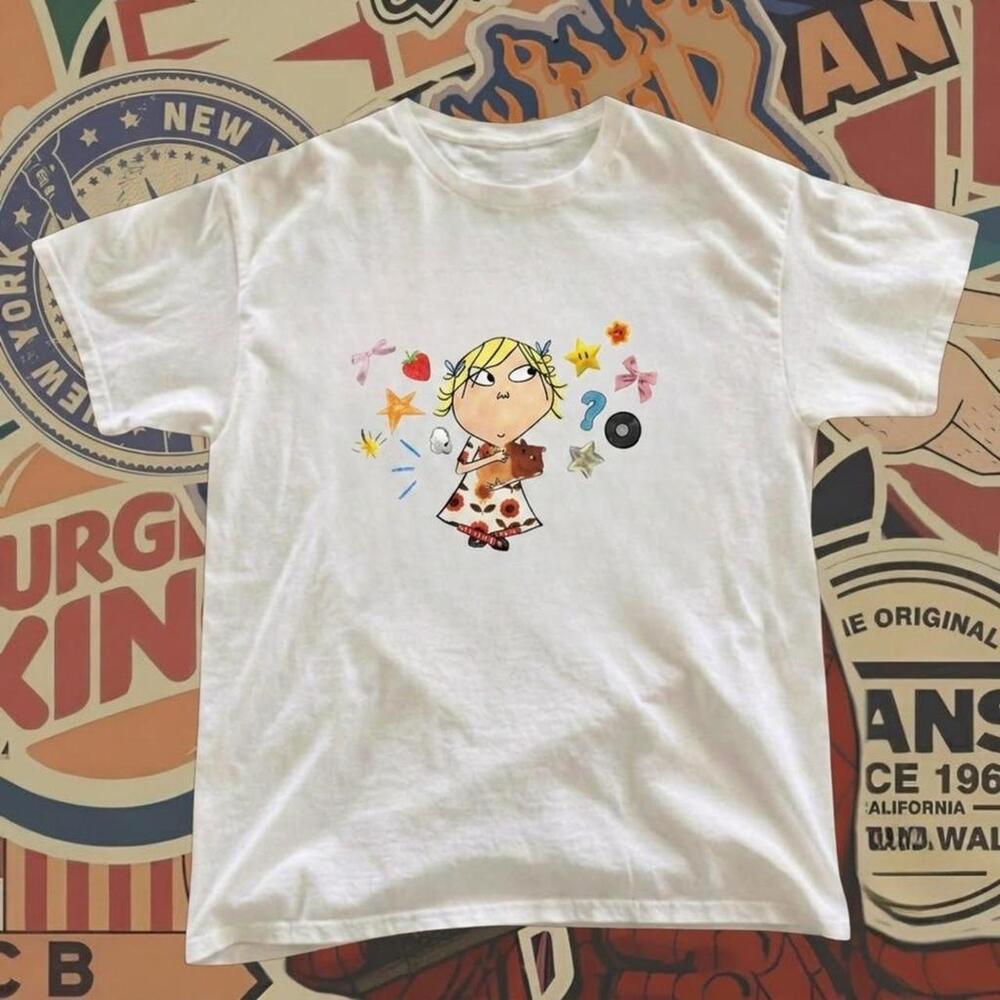 White Graphic Tee With Cartoon Girl Surrounded By Stars And Question Marks
